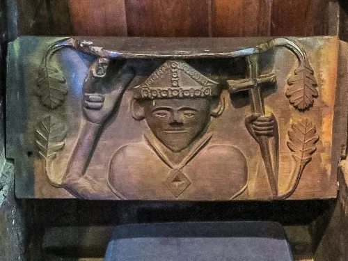 Medieval misericord of a mitred bishop