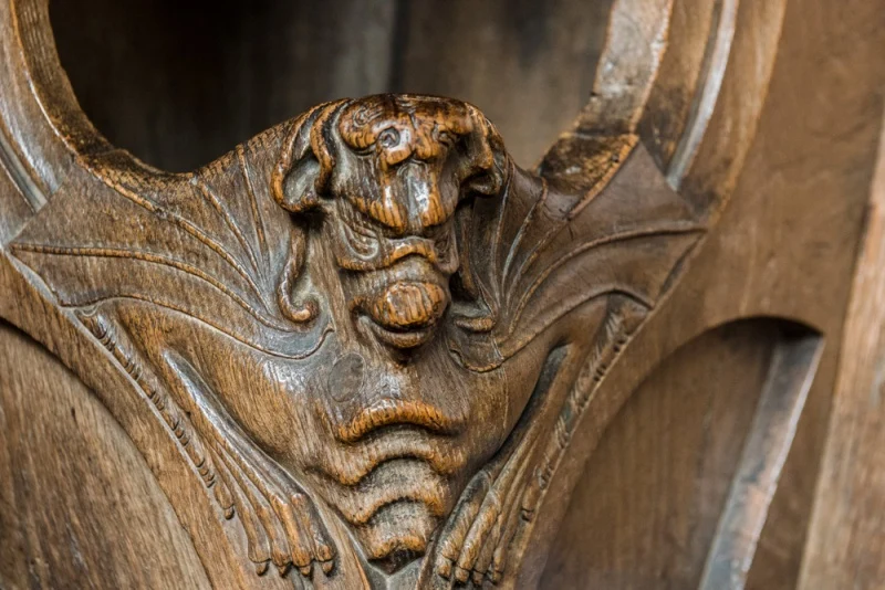 15th century bench end in the chancel
