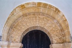 The carved doorway arch