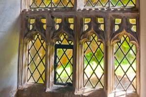 The leper window, south chancel wall