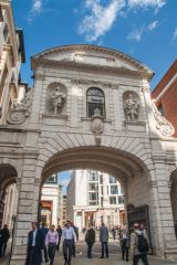 Pedestrians passing through Temple Bar