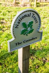 National Trust sign at The Coombes entrance