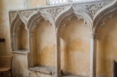 The superbly carved 14th century sedilia and piscina canopy