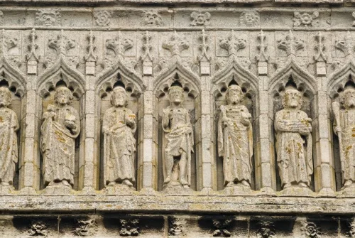 Carved figures on the west front of Thorney Abbey