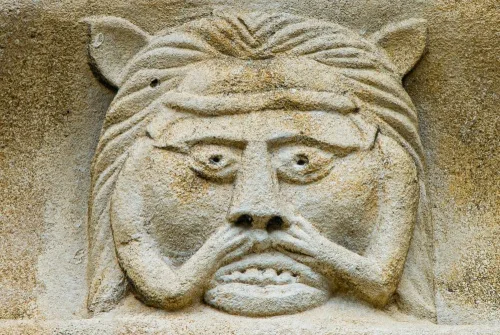 Carved figure, west front