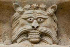 Thorney Abbey, Carved head of a lion, west front