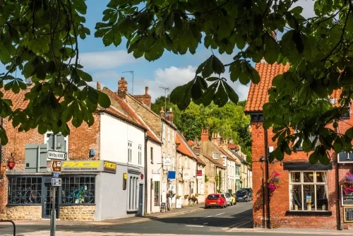 The village crossroads and the road to Whitby