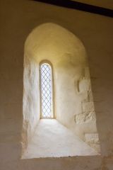 12th-century lancet window in the chancel