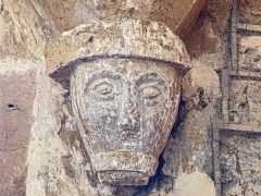 13th-century carved corbel, tower arch