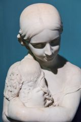 'A Child Clasping a Spaniel' by Frederick Thrupp