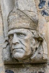 Bishop Claughton likeness beside the tower doorway