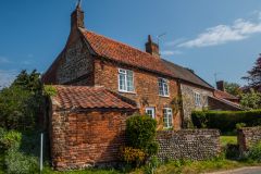 A typical brick and flint cottage