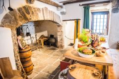 The kitchen and fireplace