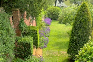 Garden terrace and clipped hedges at Upton House