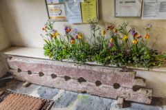 Village stocks in the church porch