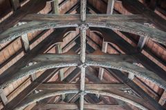 Re-used carved medieval roof timbers
