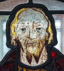 Medieval stained glass head