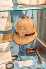 An early 20th century straw policeman's helmet