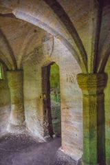 Carved chapel pillars and the sacristy doorway