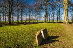 Upright stones set into the eastern edge of the barrow
