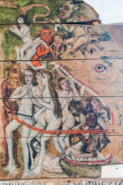 Sinners being led into Hell