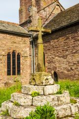 The restored 14th-century churchyard cross