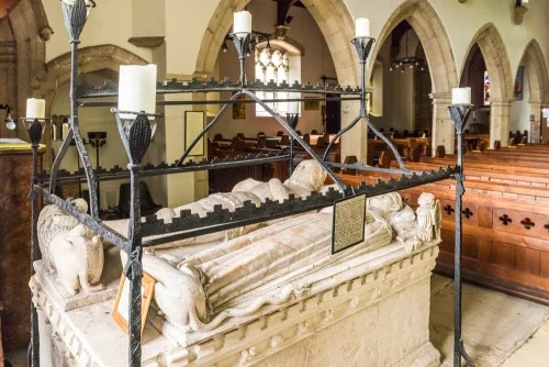 The unique wrought-iron hearse and candle holders