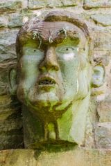 Carved head on the Stone Tower