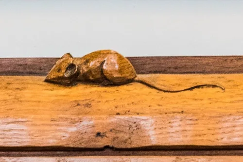 'Mouseman' Thompson mouse on the WWII memorial plaque