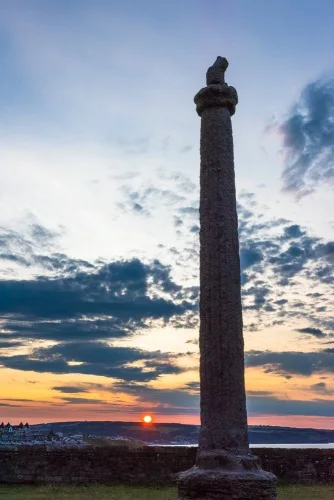A Celtic-style cross in the churchyard