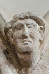 Whitchurch Canonicorum, St Candida & Holy Cross Church, 13th century carving of a head on the nave arcade