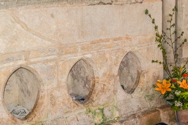 Holes in the base of St Wite's shrine