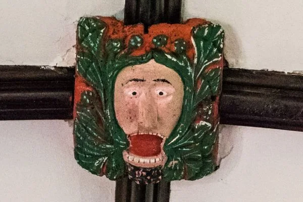 One of the four Green Man roof bosses