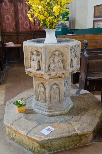 The beautifully carved 15th century font