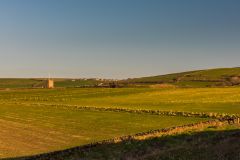 Looking across the Stitches to Forrabury Church