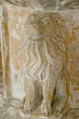 Figure of a lion on the font stem
