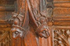 Carved choir stall arm rests
