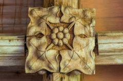 Wooden boss in the porch vaulting