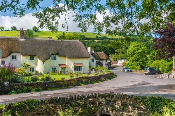Thatched cottages and a medieval bridge