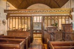 The beautifully carved chancel screen