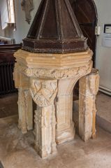 The ornately carved font