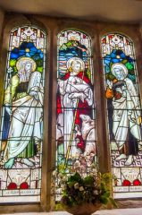 Victorian stained glass window in the aisle