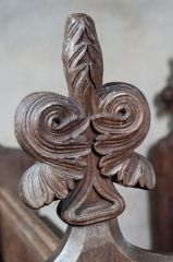 15th century poppyhead bench end