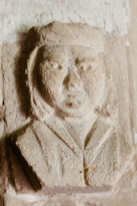 Carved head, south doorway