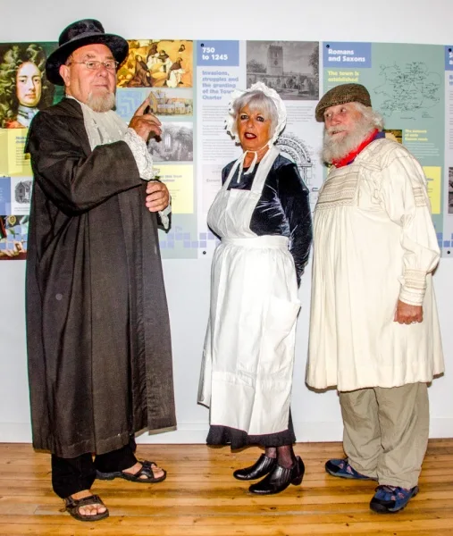 Museum volunteers dressed as historic characters