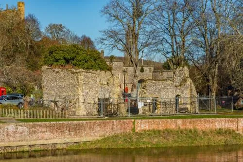 The friary from across the River Arun