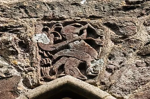 Gryphon carving, west wall