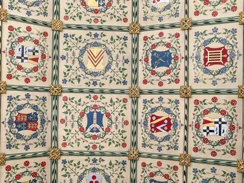 The chancel ceiling and coats of arms
