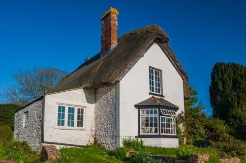 A thatched cottage near the church