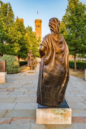 King Ethelbert (foreground) greeting Queen Bertha